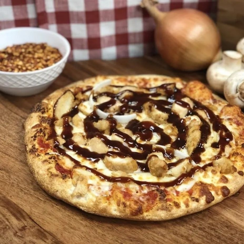 A tasty offering of pizza by manny and olga's