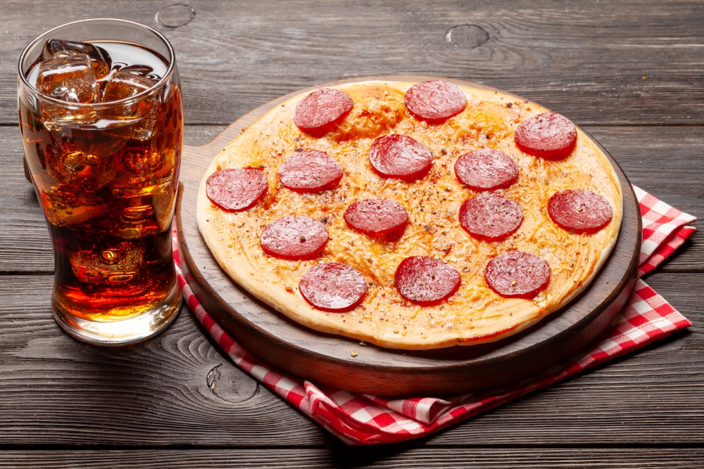 manny and olgas pizza with ice tea tasty manny and olgas pizza with ice tea