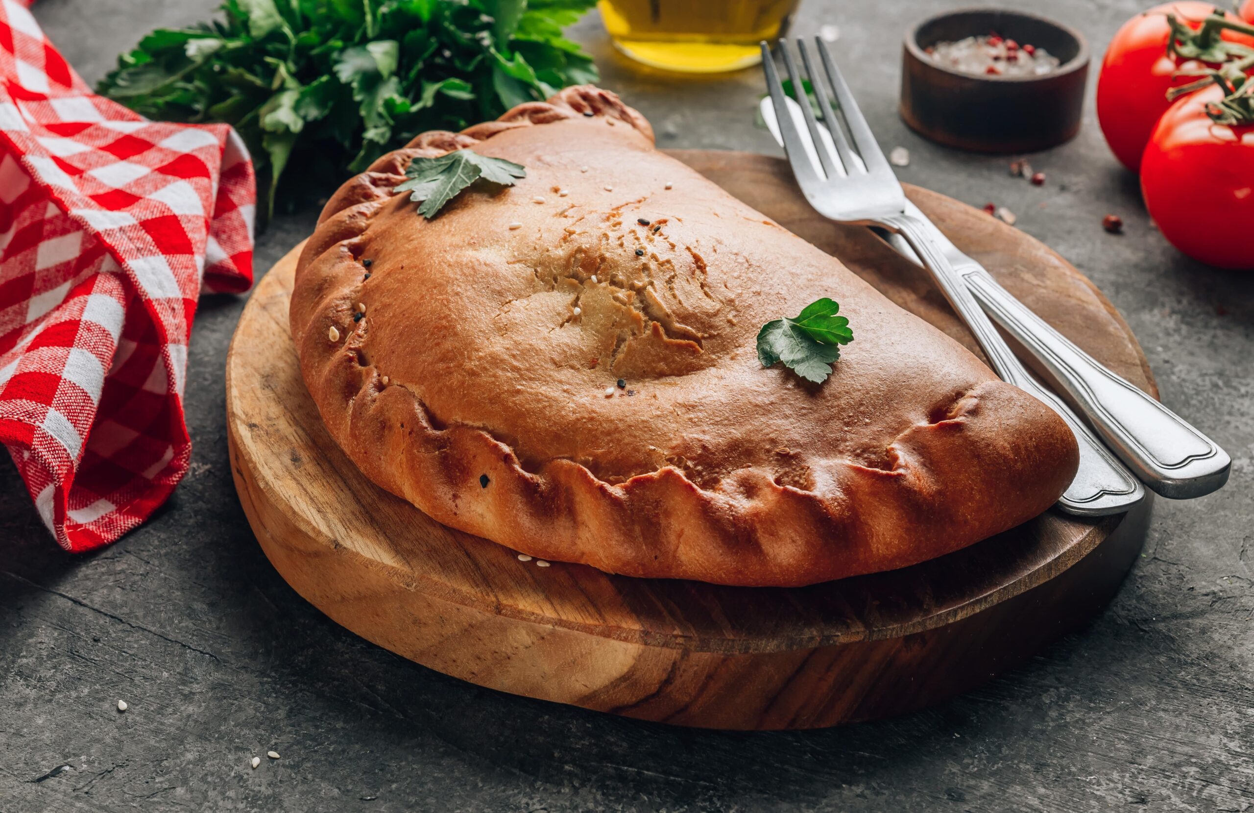 A freshly baked calzone A freshly baked calzone, ready for delivery.