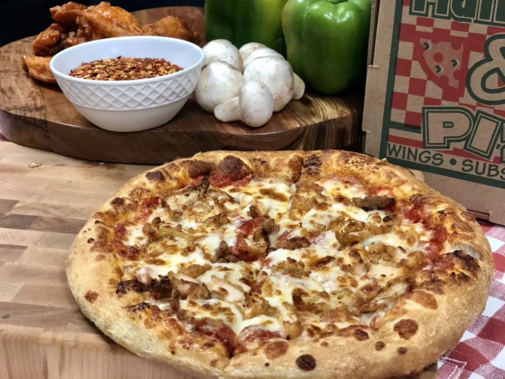 Chicken bacon ranch pizza with golden crust from Manny & Olga’s, crafted for Easter gatherings in Washington D.C. and Maryland.