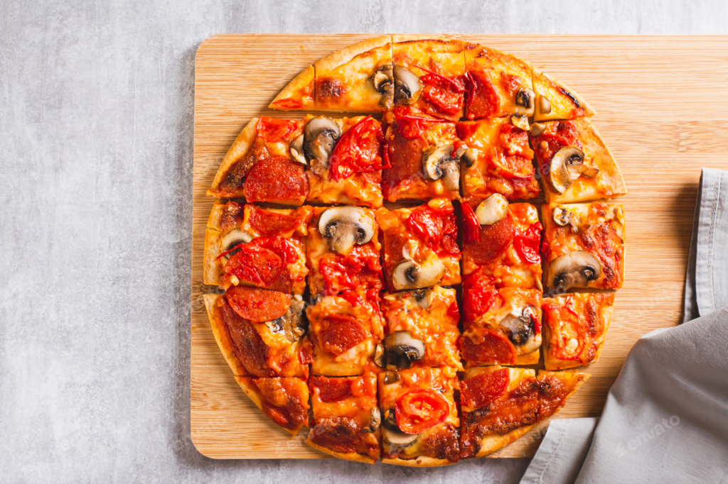 St. Louis-style round pizza cut into squares on a wooden board.