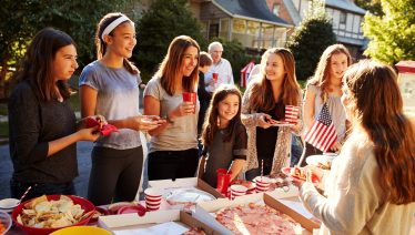 Group of teen girls celebrating July 4 in Manny & Olga’s way.